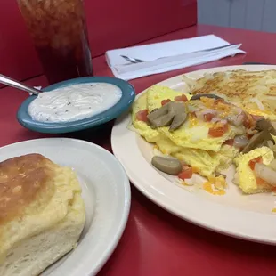 Veggie omelette without peppers, hash browns and biscuit and gravy. Forgot to take pic before we started eating. It was delicious!