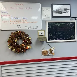 a wreath of flowers on the wall