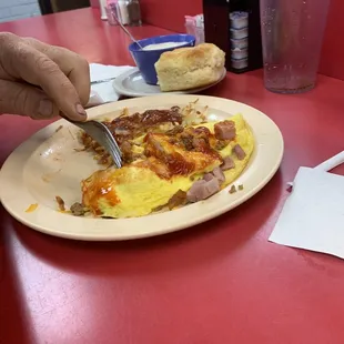 Meat omelette, hash browns and biscuit and gravy. Forgot to take pics before we dived in.