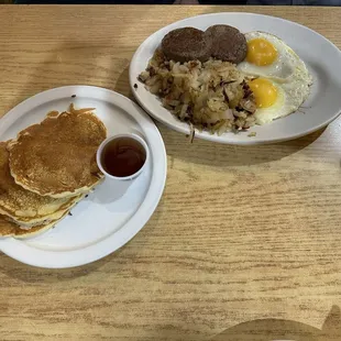 Eggs, potatoes, sausage and pancakes. $9 approx.