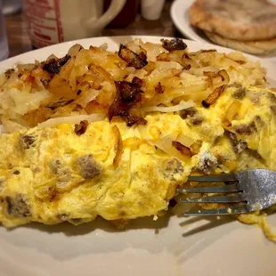Sausage and cheese omelet with hash brown with onions.  Best place for breakfast.