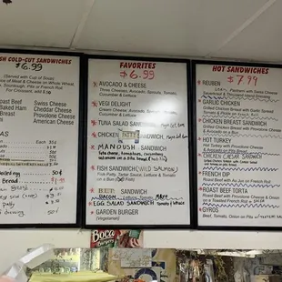 Menu on the wall, daily specials are on the left side of the counter.