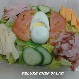 Lettuce, tomato, cucumber, hard boiled egg, turkey, ham, provolone and chedder cheese