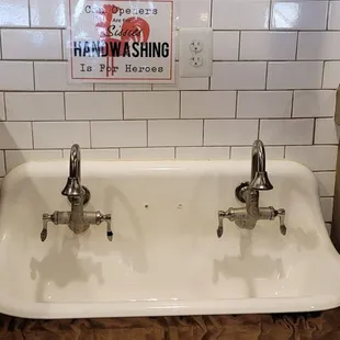 This sink is in the dining room... Guests are asked to wash hands before putting on gloves to serve themselves.