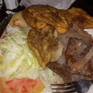 Steak with fried plantains and garlic and a salad for $11.00. Cannot beat tha price.