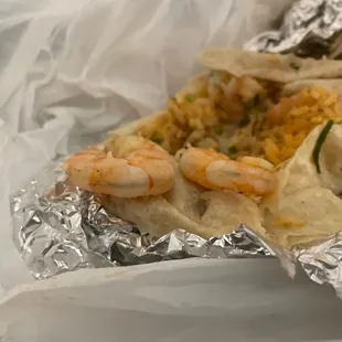 Grilled shrimp burrito with poop still in the shrimp they did not devein a shrimp and sold me the burrito for near $17