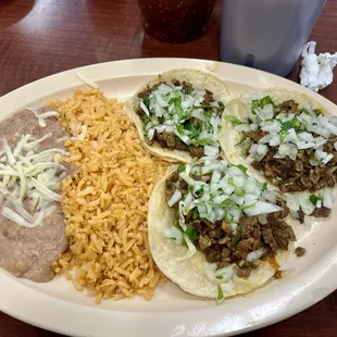 Lunch special, 3Tacos, beans &amp; rice. Delicious!!