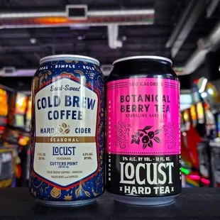 two cans of coffee on a table