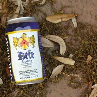 a can of beer on the ground