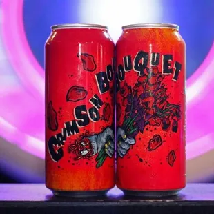 two cans of budgie&apos;s strawberry soda