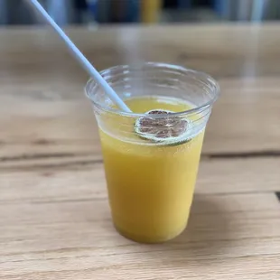 Mango/Pineapple Smoothie topped with champagne