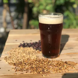 a pint of beer and grains