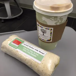Latte with soy and a turkey with mango wrap