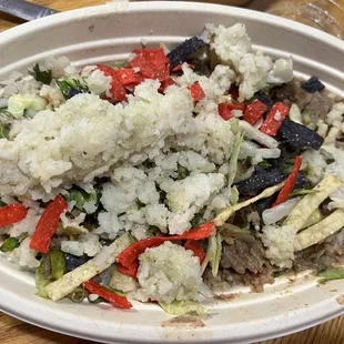 a plate of rice and vegetables