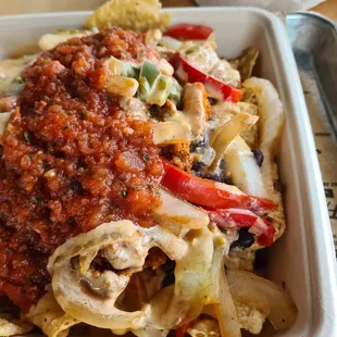 Make your own nachos, with vegan chorizo