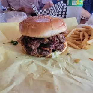 Sasquatch Burger with fries and some Mtz green chile bombs to give it another kick..