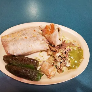 Carne asada Giant Burrito half eaten lol