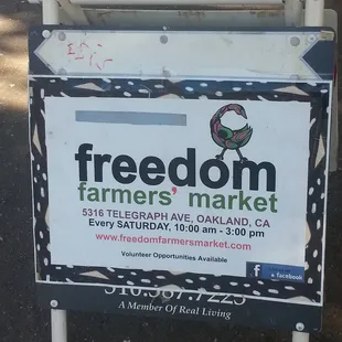 a sign for freedom farmers market