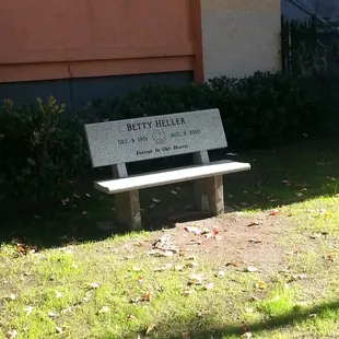 a bench in front of a building