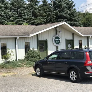 a car parked in front of a building
