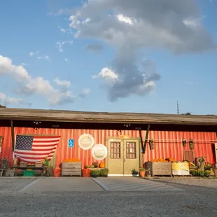 a red building with an american flag