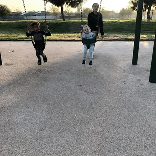 Lot's of swings to accommodate the crowds enjoying the day.