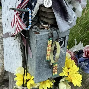 A light pole at the Freedom Rock.  A lot of people leave mementos here.