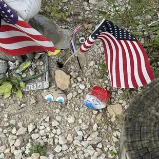 A light pole at the Freedom Rock. A lot of people leave mementos here.