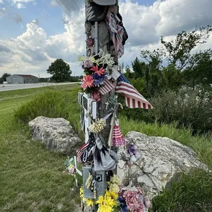 A light pole at the Freedom Rock.  A lot of people leave mementos here.