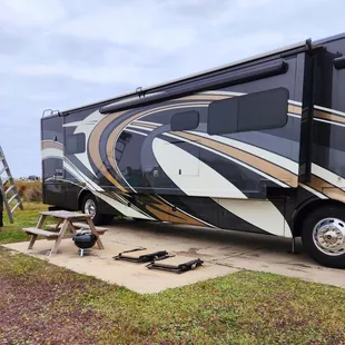 Our motorhome &amp; Mr. Denny finishing up after our heater repair.