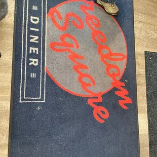 a person standing on a doormat