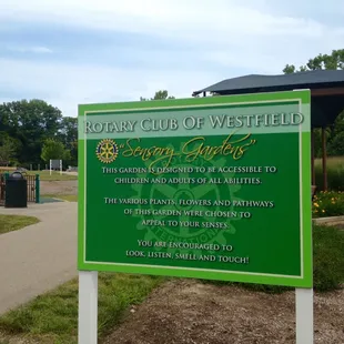 A sign at Freedom Trail Park regarding the sensory gardens, which people can touch and smell and walk through.