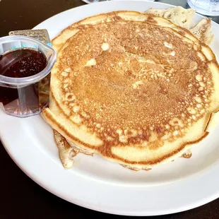 a stack of pancakes with syrup