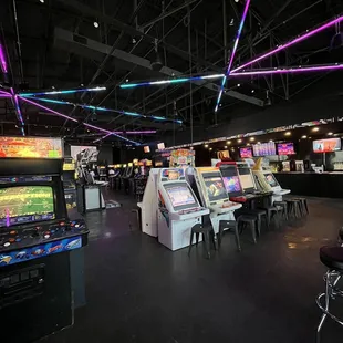 a row of arcade machines in a casino