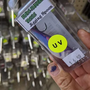 a person holding a bottle of water