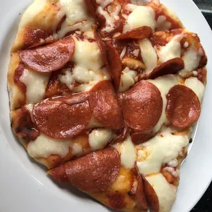 Hand thrown pepperoni flatbread