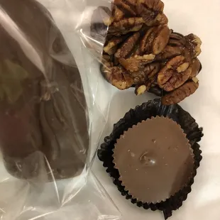 Dark chocolate peanut butter cup, pecan turtle and mini whipped cream bar