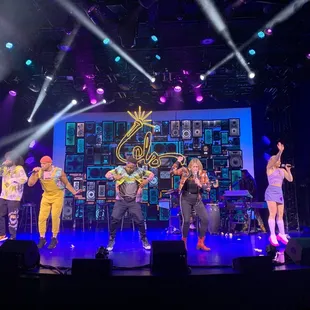 a group of people on stage