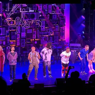 a group of people on stage