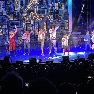 a group of people on stage