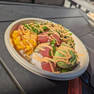 2 scoop ahi tuna, tomato, seaweed salad, mango, avocado and sushi rice with spicy mayo