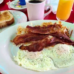 Bacon and eggs with Mimosa and coffee