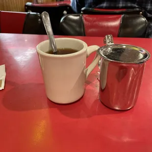 Tea.  Waiting for the creamer.