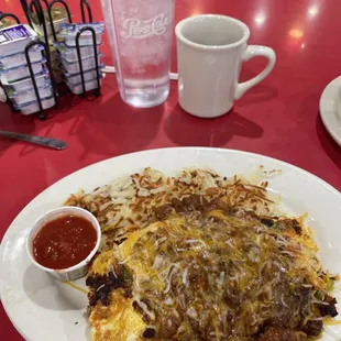 Chili Cheese omelet with biscuits and gravy!  Yummy!