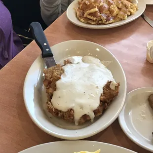 A big chicken fried steak for a breakfast portion