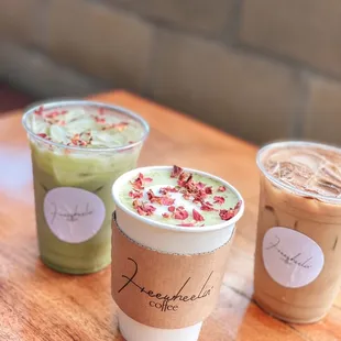 three cups of coffee on a table