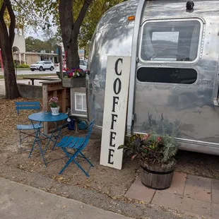 The waiting table right by the airstream.