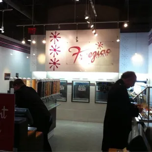 a man serving food in a restaurant