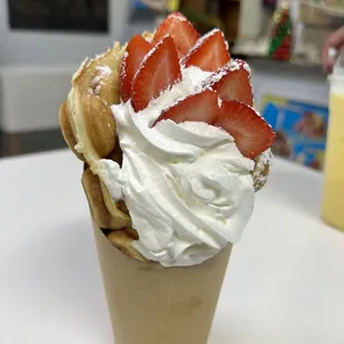 Bubble waffle with vanilla ice cream and strawberries