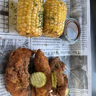 3 piece strips and fried corn.